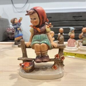 Hummel Figurine with Red and Green Accents